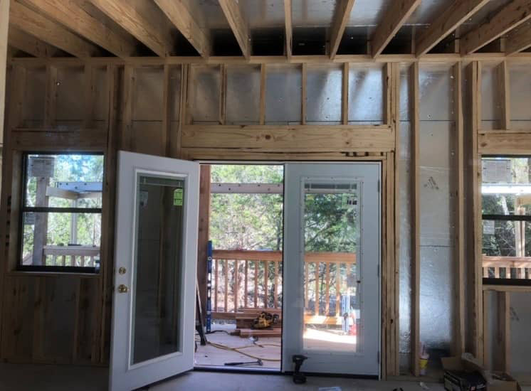 Inside view of cottage french doors opening to the outdoors